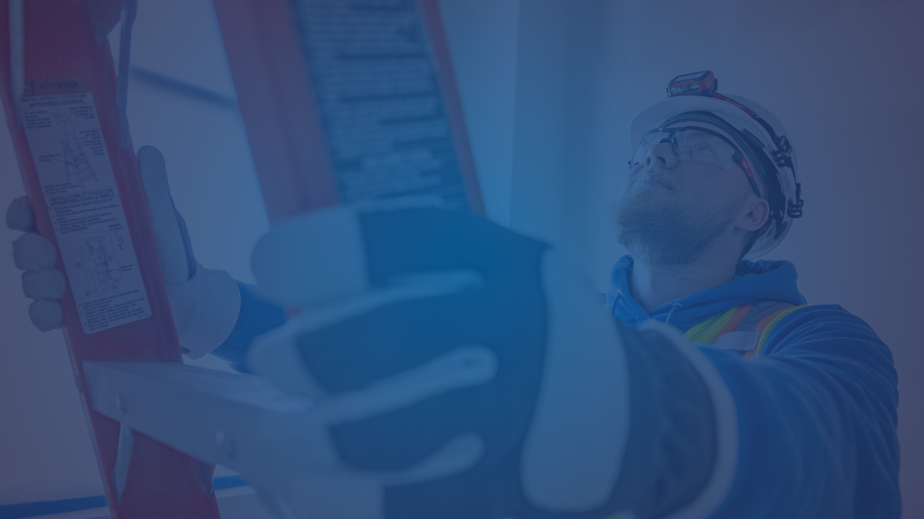 Electrician climbing a ladder